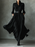 Black long sleeve maxi shirt dress with stand collar and full textured skirt