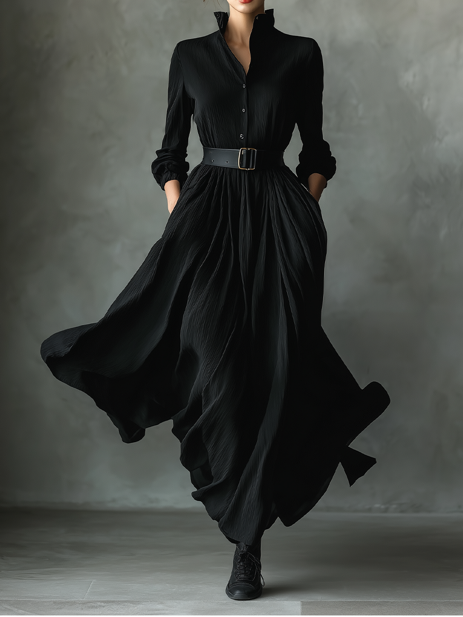 Black long sleeve maxi shirt dress with stand collar and full textured skirt