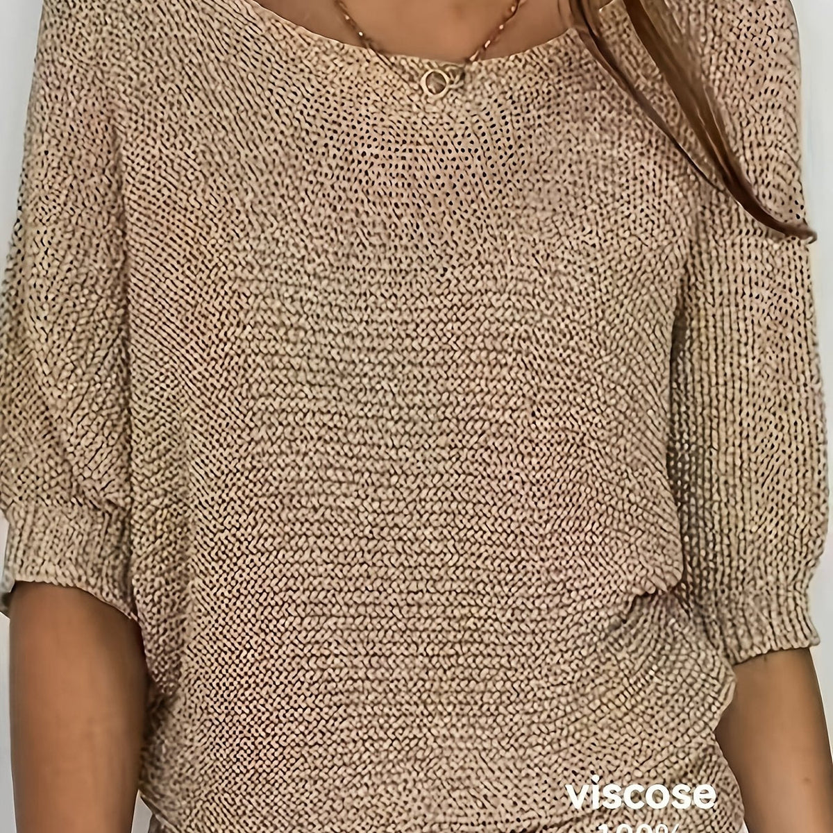 Women's beige open knit sweater with boat neckline and elbow-length dolman sleeves