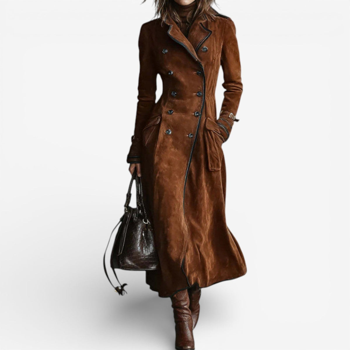 Woman wearing a long double breasted suede-look trench coat with contrast piping and flap pockets