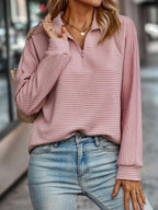 Women's ribbed quarter zip sweater with stand collar and raglan sleeves, worn with jeans - view 3