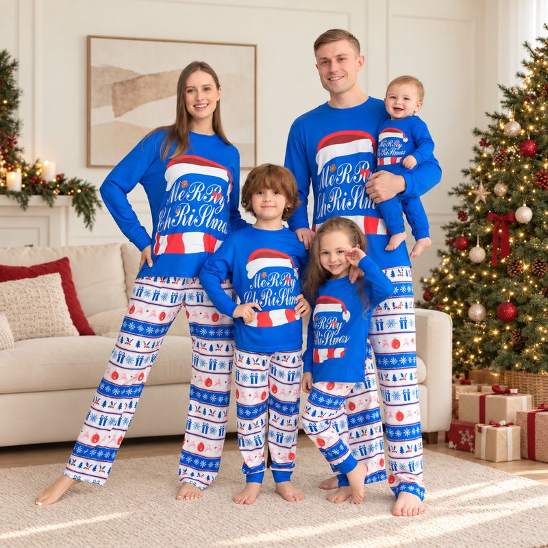 Matching family Christmas pajamas with blue Merry Christmas graphic top and holiday print pants