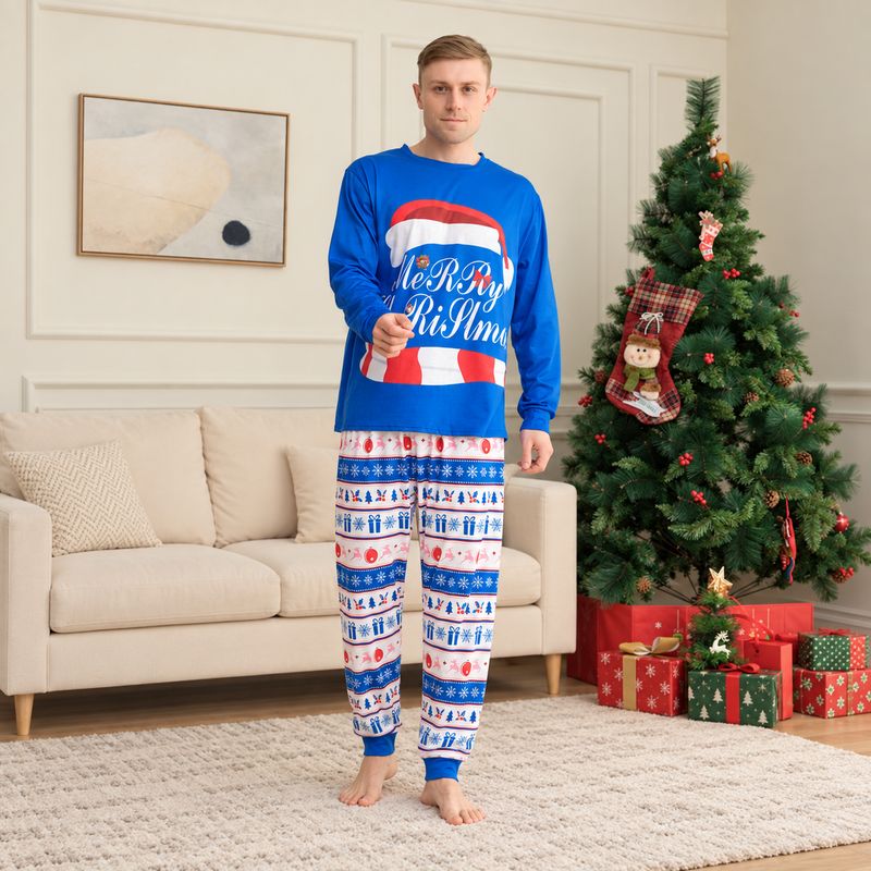 Matching family Christmas pajamas with blue Merry Christmas graphic top and holiday print pants - view 3