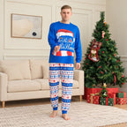 Matching family Christmas pajamas with blue Merry Christmas graphic top and holiday print pants - view 3