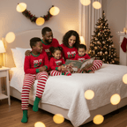 Matching family Christmas pajamas with red elf graphic top and red and white striped pants - view 8