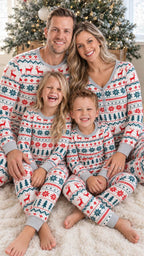 Family wearing matching Fair Isle Christmas pajamas with reindeer and snowflake print - view 16