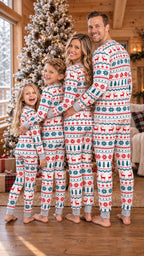 Family wearing matching Fair Isle Christmas pajamas with reindeer and snowflake print - view 18