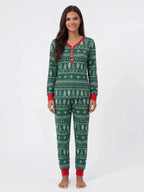 Family wearing matching green Christmas tree print pajamas with red cuffs - view 10