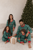 Family wearing matching green Christmas tree print pajamas with red cuffs - view 4