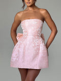 Strapless floral jacquard mini cocktail dress with oversized back bow and A-line skirt