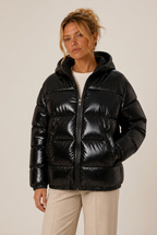 Glossy hooded puffer fall jacket for women with front zip and side pockets