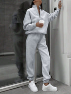 Matching gray half zip pullover and joggers sweat set