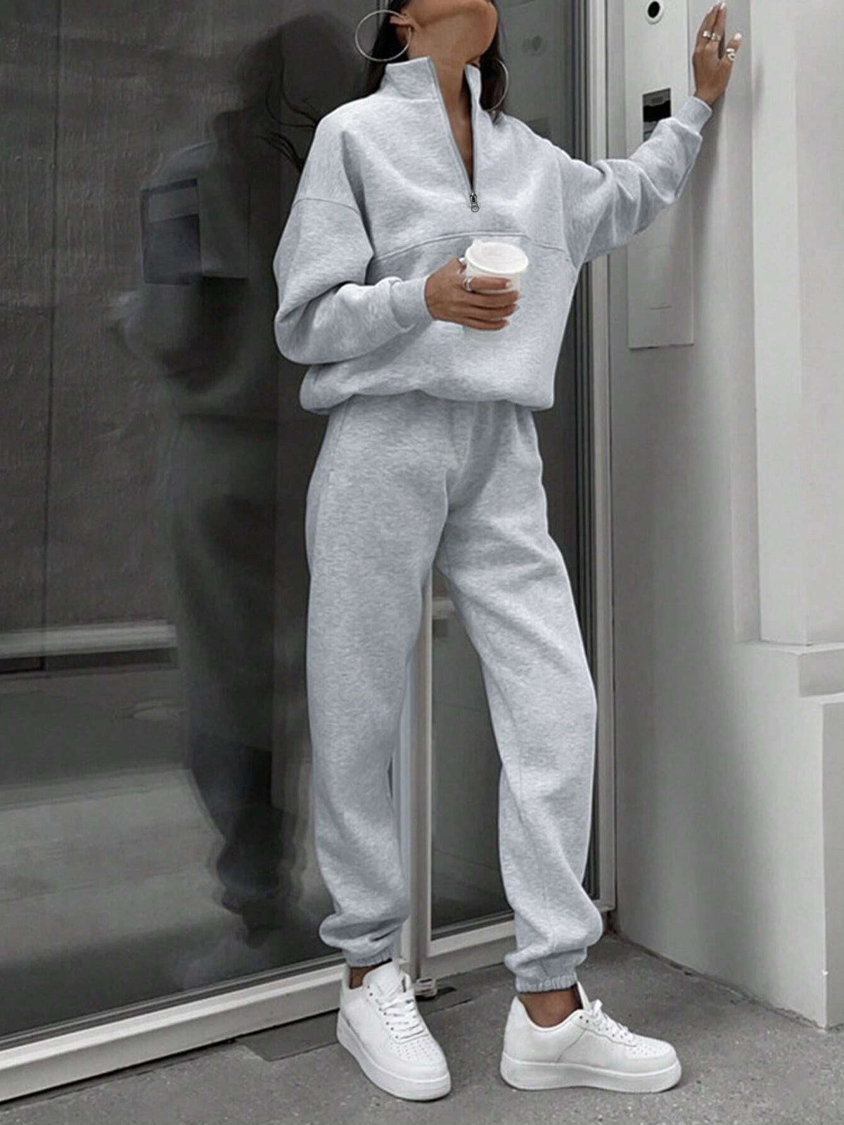 Matching gray half zip pullover and joggers sweat set