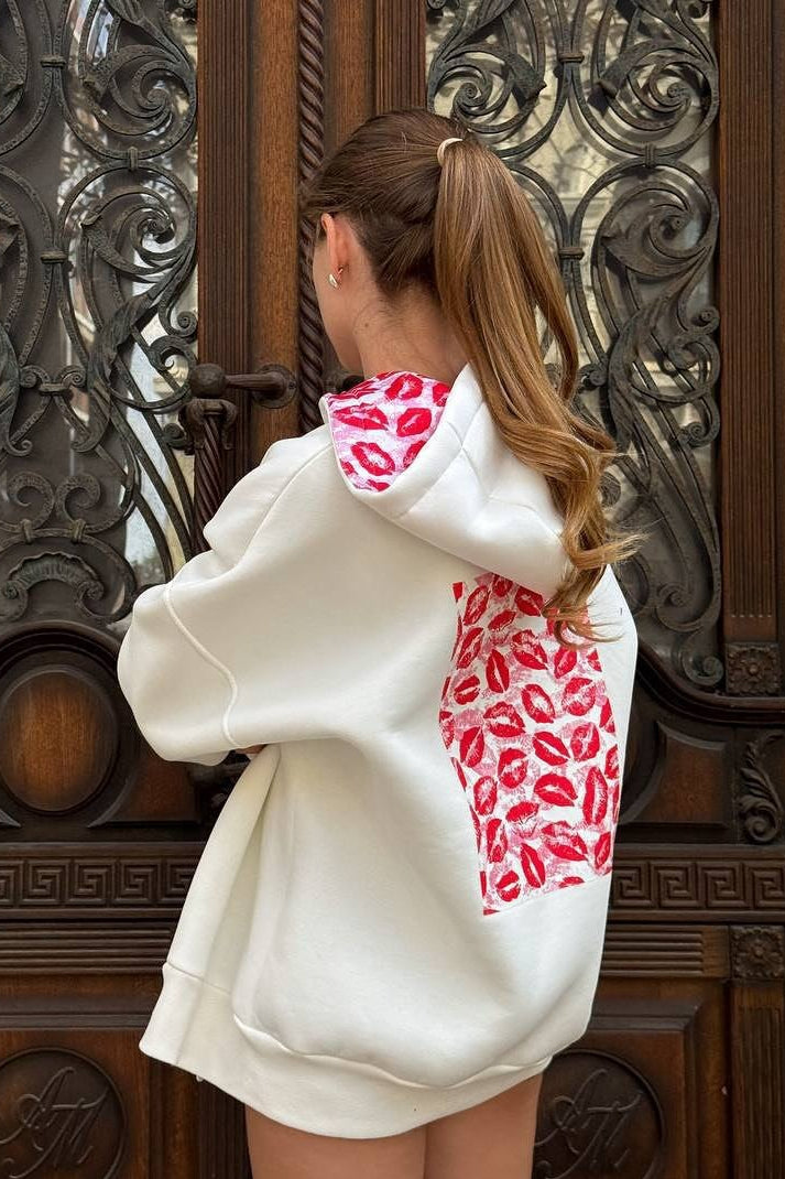 Oversized hooded zip sweatshirt with red lip graphic on the back