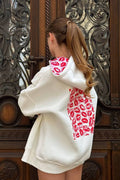 Oversized hooded zip sweatshirt with red lip graphic on the back