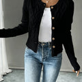 Leora cable knit crew neck cardigan with gold-tone buttons