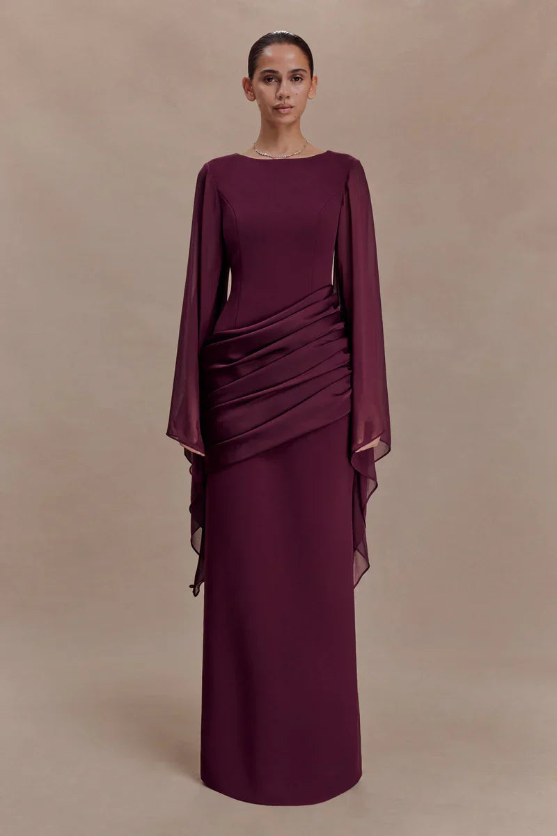 Burgundy evening maxi dress with sheer chiffon cape sleeves and draped waist, formal long sleeve dress