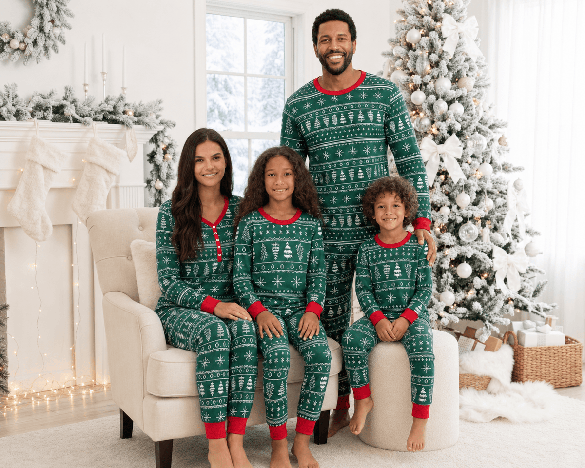 Matching family Christmas pajamas in green with white tree and snowflake print and red cuffs - view 5