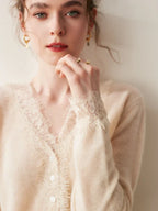 Woman wearing a gray fuzzy knit V-neck cardigan with lace trim and pearly buttons - view 11