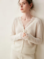 Woman wearing a gray fuzzy knit V-neck cardigan with lace trim and pearly buttons - view 12