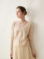 Woman wearing a gray fuzzy knit V-neck cardigan with lace trim and pearly buttons - view 13