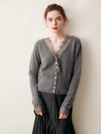 Woman wearing a gray fuzzy knit V-neck cardigan with lace trim and pearly buttons - view 2