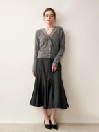 Woman wearing a gray fuzzy knit V-neck cardigan with lace trim and pearly buttons - view 4