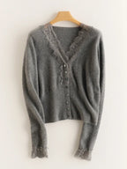 Woman wearing a gray fuzzy knit V-neck cardigan with lace trim and pearly buttons - view 6