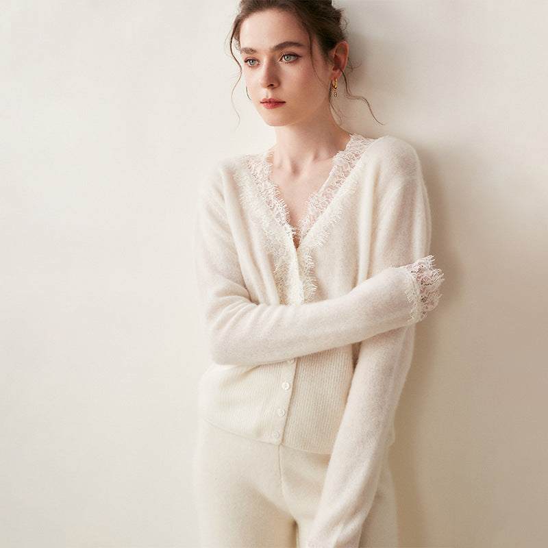 Woman wearing a gray fuzzy knit V-neck cardigan with lace trim and pearly buttons - view 9