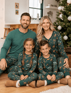 Family wearing matching green safari animal print Christmas pajamas - view 6
