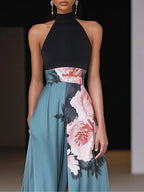Satin halter A-line maxi dress with black mock-neck bodice and pink floral print blue skirt - view 2
