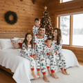 Matching family Christmas pajamas with red truck and tree print and red ribbed trim