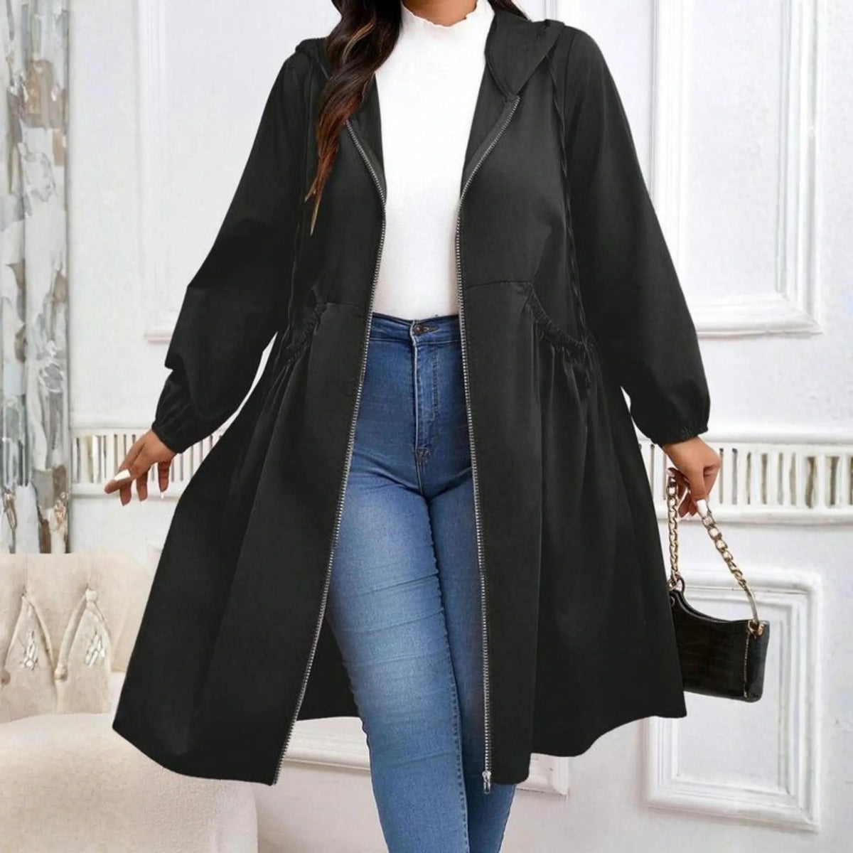 Longline hooded coat for women with zip front and cinched waist