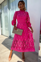 Woman wearing a long sleeve guipure lace midi dress with mock neck and puff sleeves - view 5