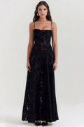 Sheer floral bustier maxi dress with spaghetti straps and flowing floor-length skirt