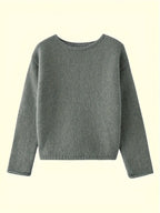 Women's oversized fuzzy knit sweater with wide round neckline layered over a white shirt - view 10