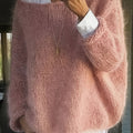 Women's oversized fuzzy knit sweater with wide round neckline layered over a white shirt - view 11