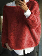 Women's oversized fuzzy knit sweater with wide round neckline layered over a white shirt - view 2
