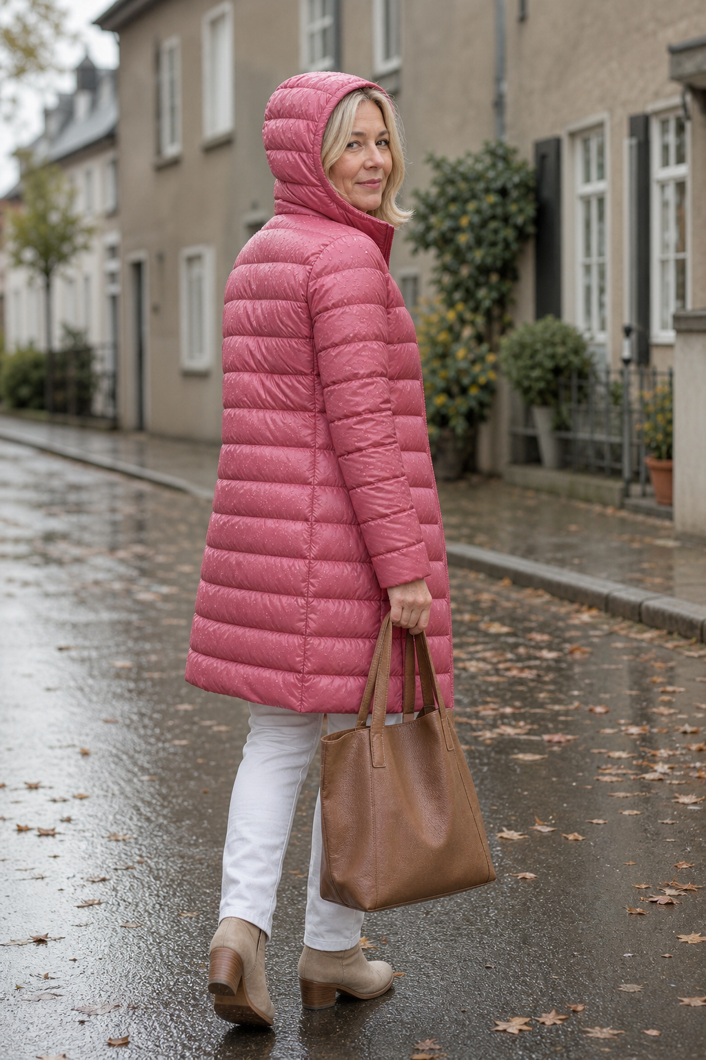 Women's long pink hooded puffer coat with quilted shell and front zip - view 11