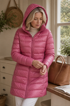 Women's long pink hooded puffer coat with quilted shell and front zip - view 12