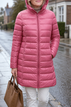 Women's long pink hooded puffer coat with quilted shell and front zip - view 7