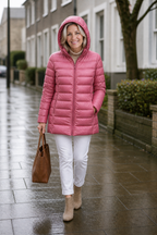 Women's long pink hooded puffer coat with quilted shell and front zip - view 8