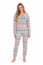 Family wearing matching reindeer print Christmas pajamas with gray ribbed cuffs - view 11