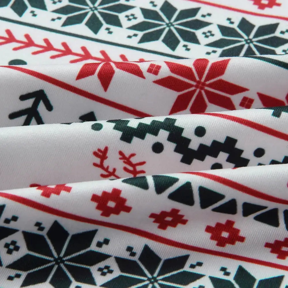 Family wearing matching reindeer print Christmas pajamas with gray ribbed cuffs - view 16