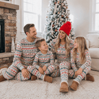 Family wearing matching reindeer print Christmas pajamas with gray ribbed cuffs - view 2