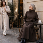 Woman in a brown knit turtleneck and A-line maxi skirt set outdoors - view 4