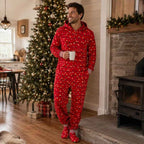 Red hooded footed Christmas onesie with string-light bulb print worn by a matching family - view 4