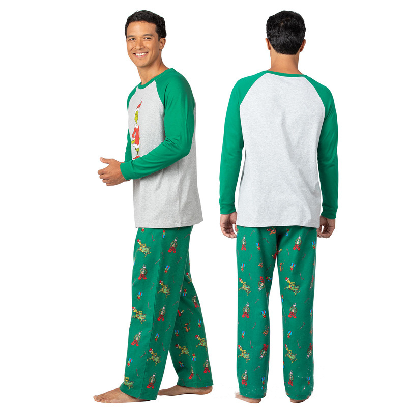 Matching family Christmas pajamas with gray raglan top, green sleeves and green character print pants - view 8