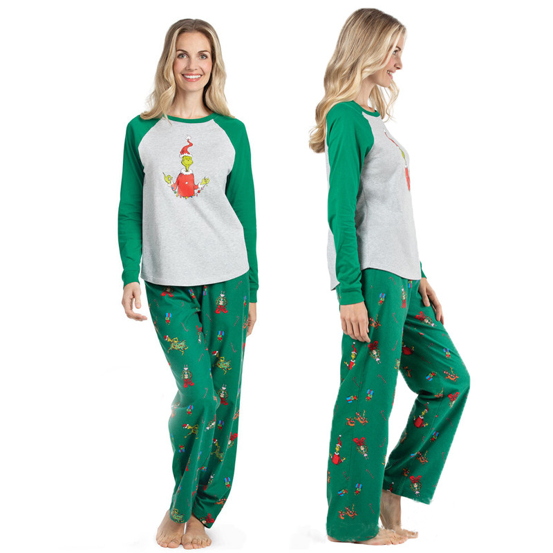 Matching family Christmas pajamas with gray raglan top, green sleeves and green character print pants - view 9