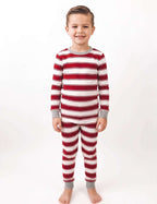 Family wearing matching red and white striped Christmas pajamas with gray trim - view 10